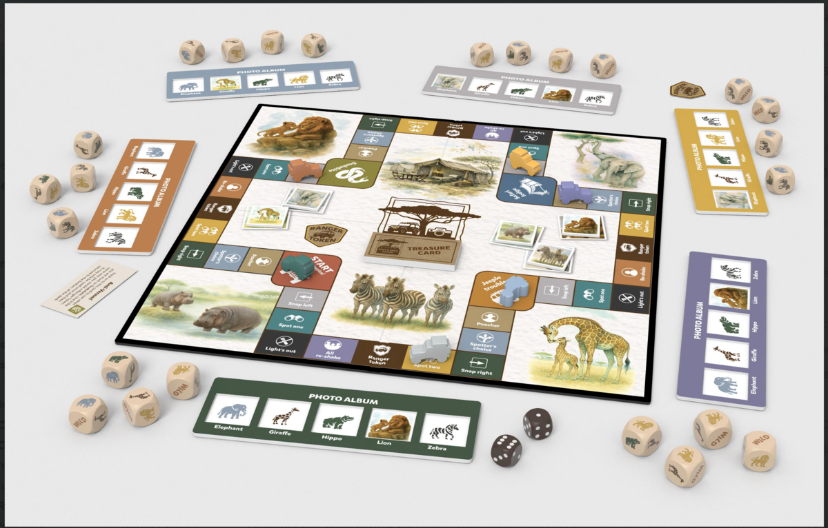 Board game with various cards and dice on a white surface